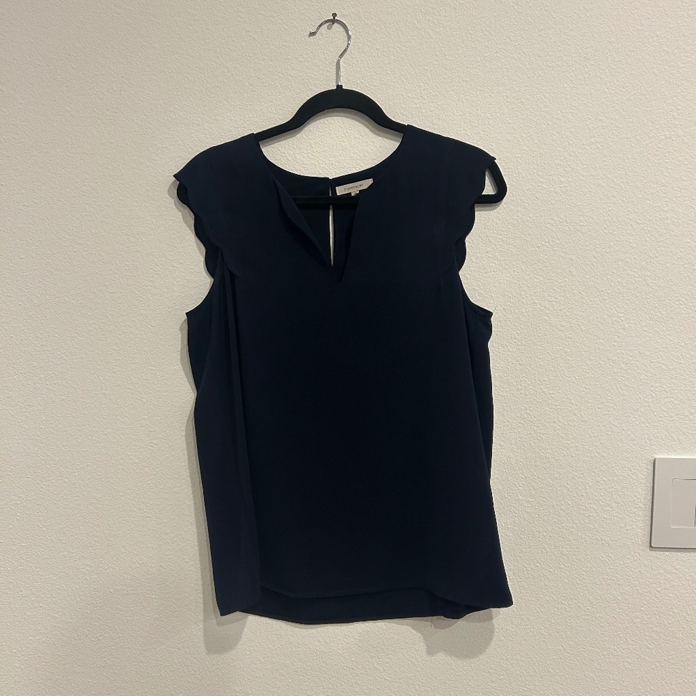 41 Hawthorn scallop-sleeve navy blouse – size M